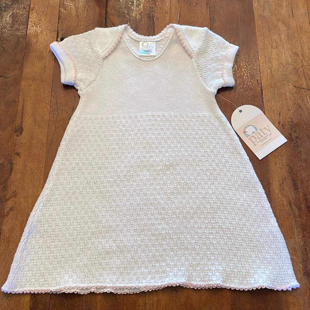 Paty, white dress w/ pink trim. Size 3mo. Made in USA, cotton/ poly blend.